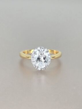 Gold Oval Halo Two-Tone Ring with Clear Center Stone